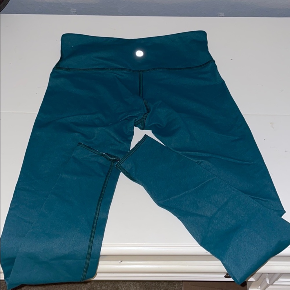 Lululemon size 4 dark greenish bluish leggings